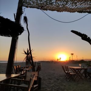 Posta de sol a la platja del Prat des del Calamar